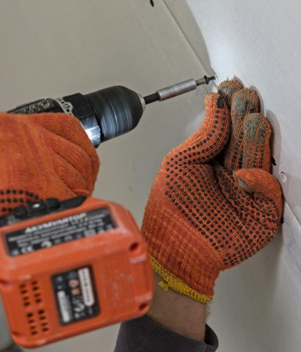 fastening-drywall-process-in-close-up.jpg